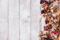 Top view of Dried flowers on wooden table background. Free space for your text. Royalty Free Stock Photo