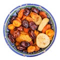 Top view of dried fruits in ceramic bowl isolated Royalty Free Stock Photo
