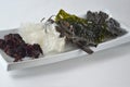 Top view of dried kelp, nori, dulse, wakame, alaria and agar agar seaweed Royalty Free Stock Photo