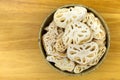 Top view of dried Lotus root in a bowl, sliced rhizome of lotus
