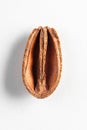 Top view on dried peel of nut on white background Royalty Free Stock Photo