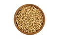 Top view of dried Wheat Berries in wooden bowl. Dry wheat berry