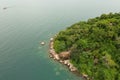 Top view drone shot of a stoney cliff of a coastline