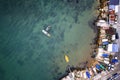 The pier and the marina with boats and yachts. Sea landscape with fishing houses from above Royalty Free Stock Photo