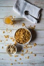 Top view of dry fruits, corn flakes and fruit juice Royalty Free Stock Photo