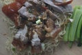 Top view of Dry Yellow noodles with Grilled Duck and Crispy Pork. Royalty Free Stock Photo