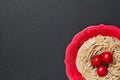 Top view durum wheat spaghetti on red plate on black background Royalty Free Stock Photo