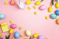 Top view Easter holiday background concept. Colorful eggs, bunny