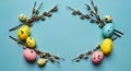 Top View Easter Scene: Willow Catkins & Eggs Framed by Egg Shape on Pastel Blue Base Royalty Free Stock Photo