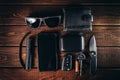 Top view of EDC or Everyday Carry items of modern urban man : folding knife, wallet, phone, keys, flashlight and