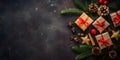 Top view of elegantly arranged gifts, gingerbread, pinecones, pine branches and Christmas trees on right.Christmas banner with