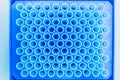 Top view of empte blue test tubes background. Science, chemistry, biology and medicine concept Royalty Free Stock Photo