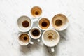 Dirty cups of coffee afterparty Royalty Free Stock Photo