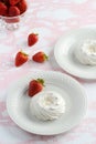 Top view empty meringue nests with strawberries