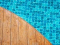 Top view of empty wooden plank table or deck floor curved shape in front of the blurred background.