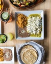 Top view of Enchilada with tortillas and Moscow mule on a wooden surface