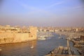 Top view of the entrance to the Vieux Port of Marseille, among the moored boats, in the sunset light Royalty Free Stock Photo