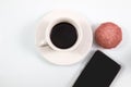 Top view, Espresso coffee in white cup with homemade brownie muffin cakes and smartphone isolated on white background, Coffee Royalty Free Stock Photo