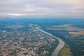 Top view of the evening city in fog, river, fields and forest Royalty Free Stock Photo