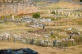 Top view of the excavation site in ruined ancient city of Hierapolis. The remains of destroyed buildings and columns