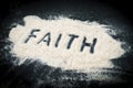 Top view of Faith text written on sand Royalty Free Stock Photo