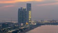 Top view of famous towers buildings in Abu Dhabi day to night timelapse. Royalty Free Stock Photo