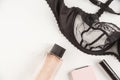 Top view fashion black lace lingerie and perfume bottle. Set of women`s accessories and underwear