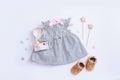 Top view fashion trendy look of baby girl clothes and toy stuff. Baby fashion concept Royalty Free Stock Photo