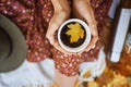 Top view of fashionable autumn style girl holding cup with coffee Royalty Free Stock Photo