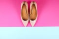 Top view of fashionable feminine medium heeled women`s leather shoes of pastel colors on heels / wedge for spring-summer season. Royalty Free Stock Photo
