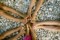 Kids feet on pebble beach