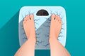 Top view of feet of woman standing on broken cracked weight scales