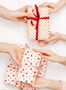 Top view of female hands holding gifts for different occasions Royalty Free Stock Photo