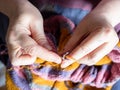 top view of female hands knitting sweater closeup Royalty Free Stock Photo