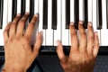 Top view of female hands playing piano Royalty Free Stock Photo