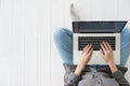 Top view of female hands typing on computer keyboard closeup, business woman or student using laptop at home, online learning Royalty Free Stock Photo