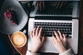 Top view female hands typing on laptop Royalty Free Stock Photo