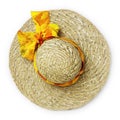 Top view female summer straw hat with ribbon and yellow bow, isolated in white background Royalty Free Stock Photo