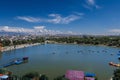 Top view from Ferris wheel of Altyn Eye Park and lake in Shymkent in summer