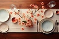 Top view festive table setting with plates, cutlery and flowers in pale colors