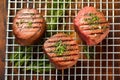 top view of filet mignon with grill marks on cooling rack