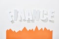 Top view of finance inscription with orange statistic graph on white background.