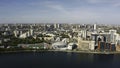 Top view of financial district with river. Stock footage. Beautiful landscape of modern city with river on sunny summer Royalty Free Stock Photo