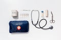 Top view of first aid kit with medical items. Royalty Free Stock Photo