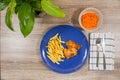 Top view of fish and chips and a bowl carrot salad as a side Royalty Free Stock Photo