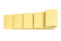 Top view of five stacks of yellow mail envelopes arranged in line in descending order imitating stairs isolated on white