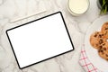 Tablet touchpad mockup with a plate of cookies and a glass of milk