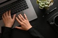 Top view, flat lay, A businesswoman or female hands typing on notebook laptop keyboard Royalty Free Stock Photo