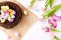 Top view and flat lay of conceptual arrangement decoration for Happy Easter holiday on wood background