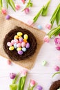 Top view and flat lay of conceptual arrangement decoration for Happy Easter holiday on wood background